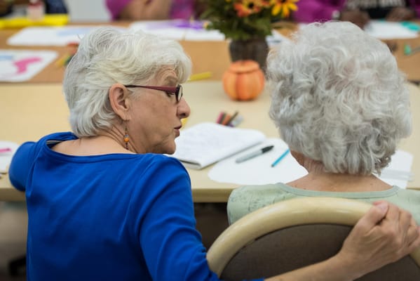 Residents engaged in an arts and crafts activity