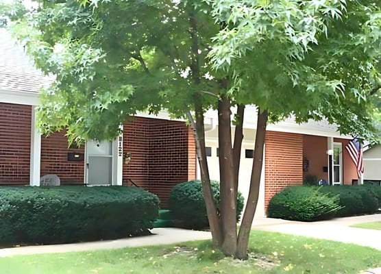 Exterior view of the building with green landscaping