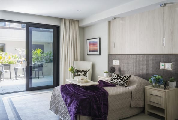 Well-decorated resident room with outdoor view