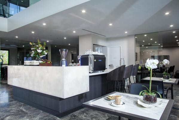 Bright interior of a café with seating and refreshments