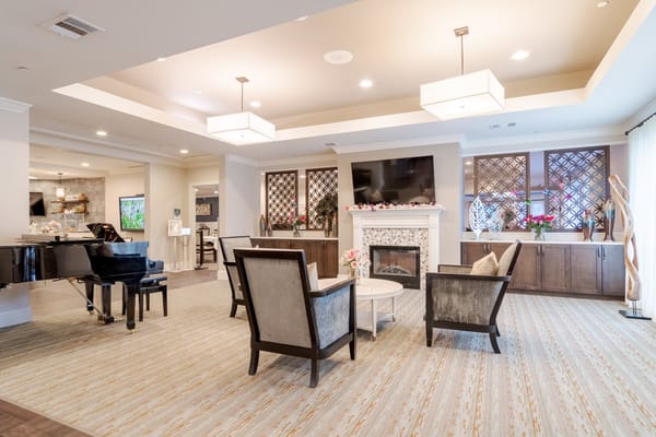Interior common area with seating and piano