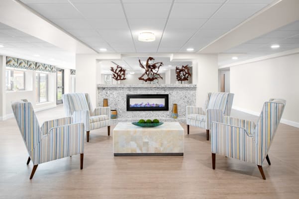 Comfortable lounge area with decorative fireplace