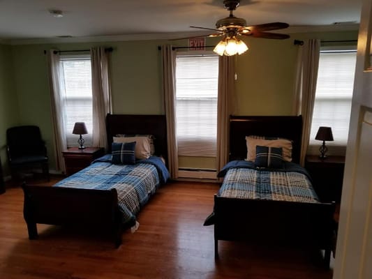 Two twin beds in a shared resident room