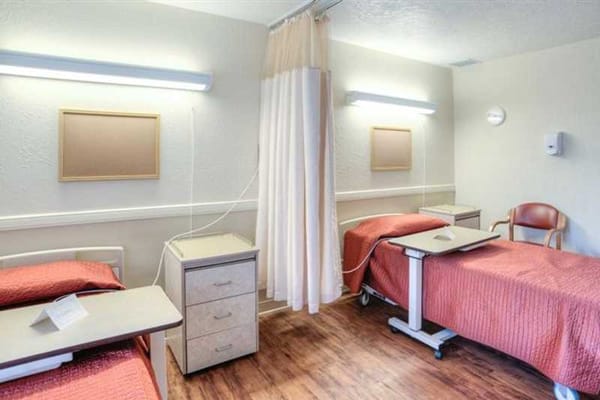 Interior view of a resident room with two beds