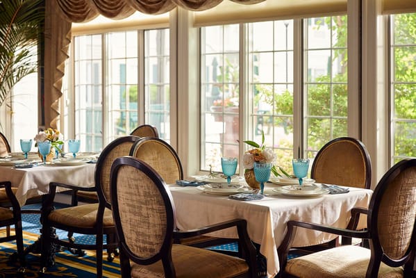 Elegant dining room with decorated tables and chairs