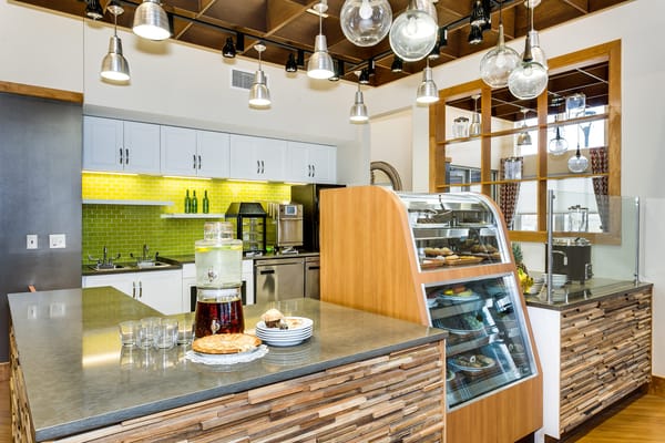 Modern cafe area with snacks and beverages on display