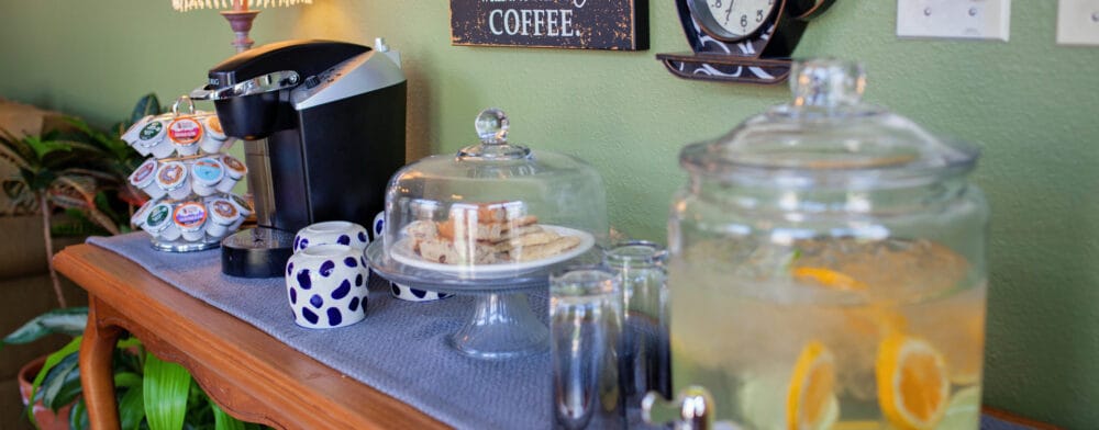 Cafe area with coffee and cookies on display