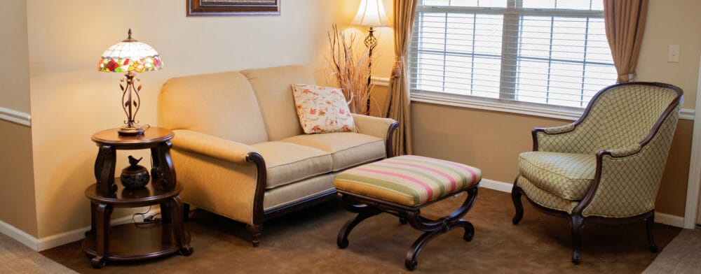 Cozy sitting area with sofa and lamp