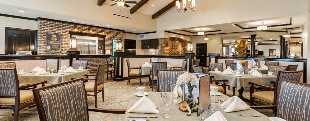 Elegant dining room setup with tables and chairs