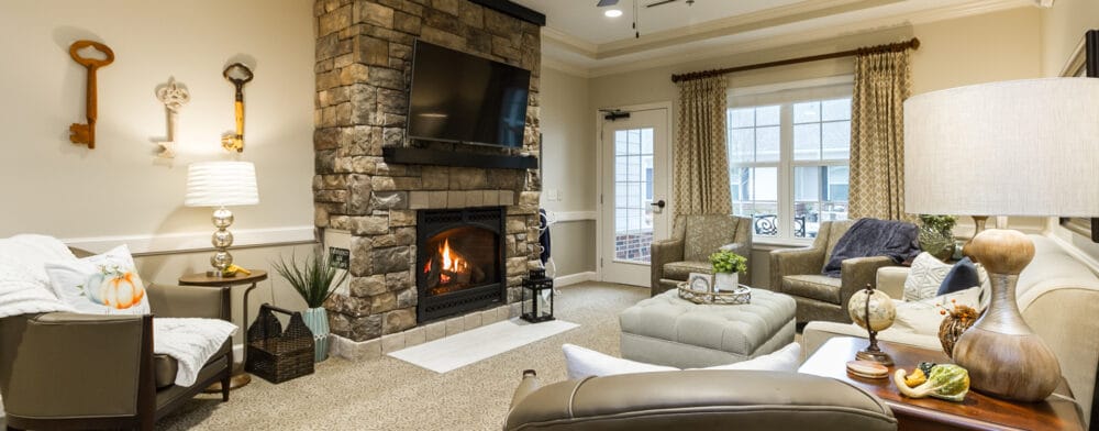 Cozy common area with a fireplace and comfortable seating