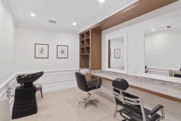 Interior view of a salon area with styling chairs