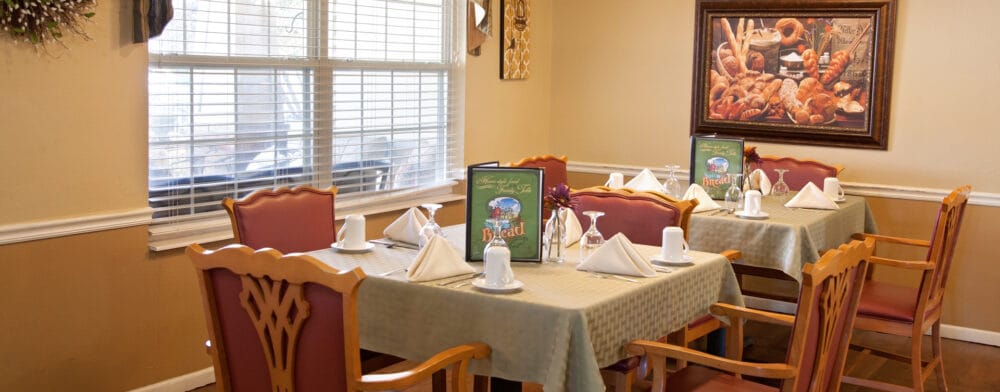 Dining area set with elegant table settings