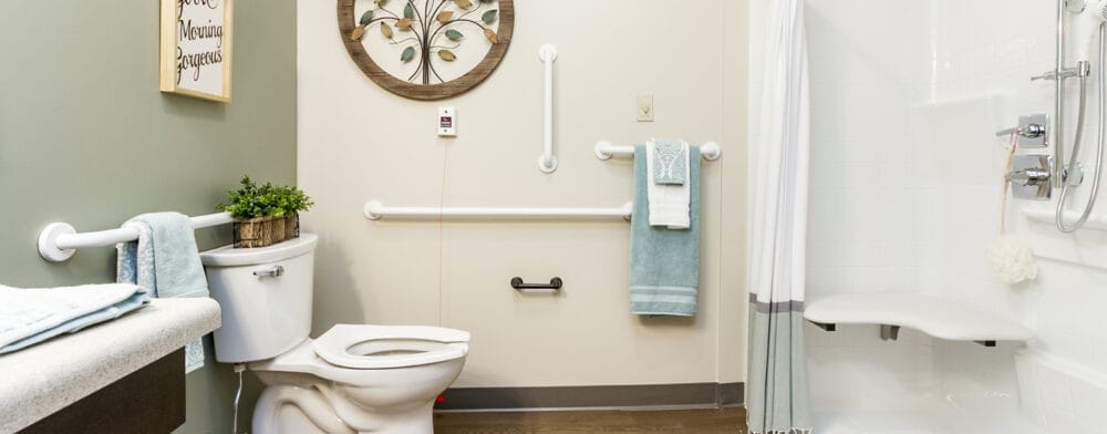 Brightly decorated bathroom in a resident suite