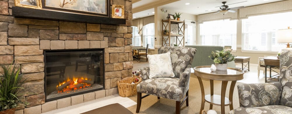 Cozy common area with comfortable seating and a fireplace