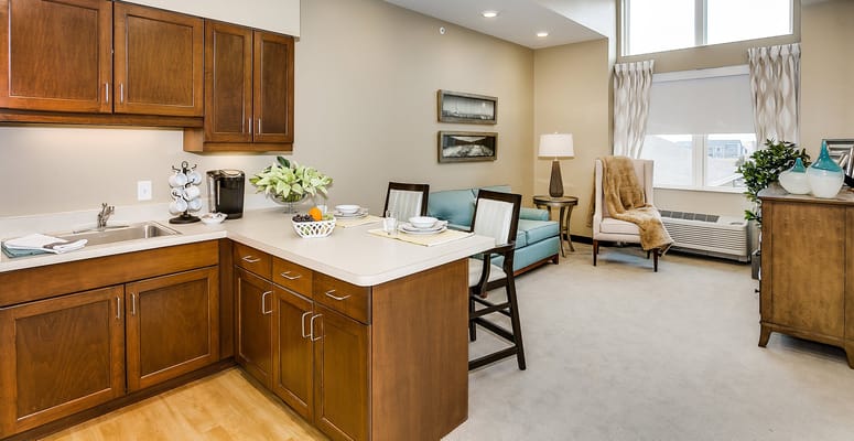 Stylish interior of a resident room with kitchenette