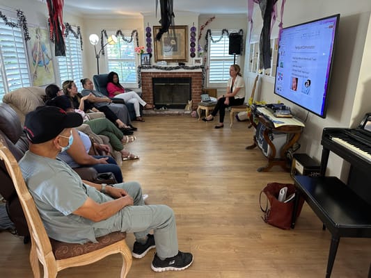 Residents participating in an activity session in the common area