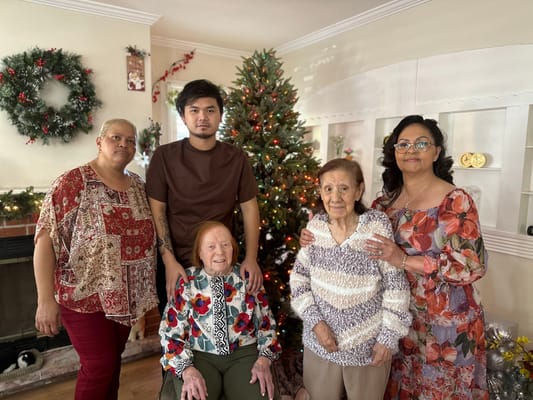 Residents and staff celebrating Christmas together