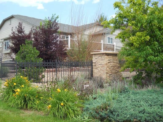 Exterior view of Cardan Manor with landscaping