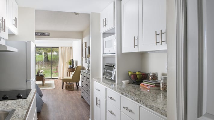 Bright kitchen area in a resident unit with modern amenities