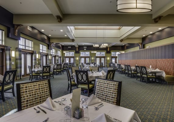 Dining room with tables set for a meal