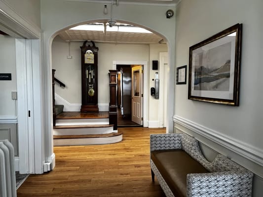 Interior hallway with seating and decorative elements