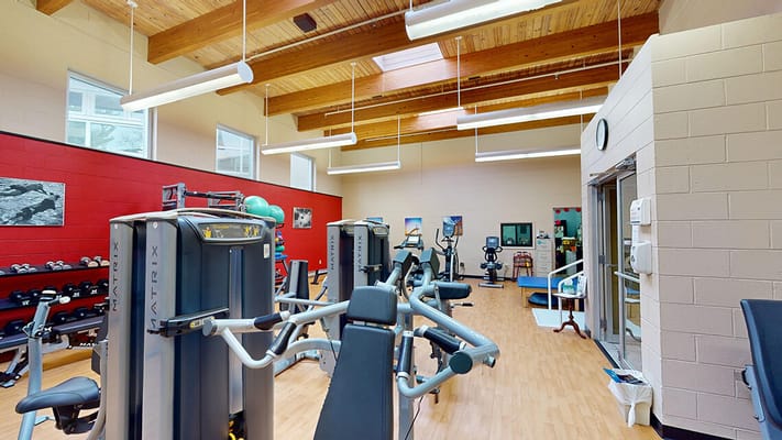 Interior view of a fitness room with exercise equipment