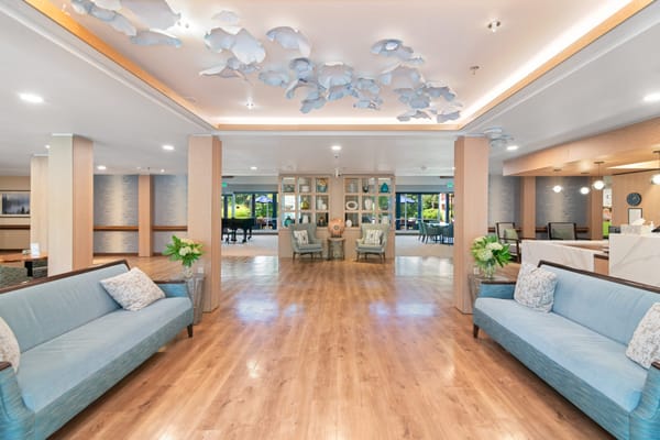 Bright lobby with cozy seating and decorative features