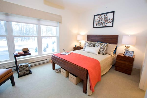 Cozy resident bedroom with a bright window