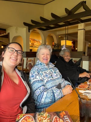 Residents enjoying a meal together in a dining area