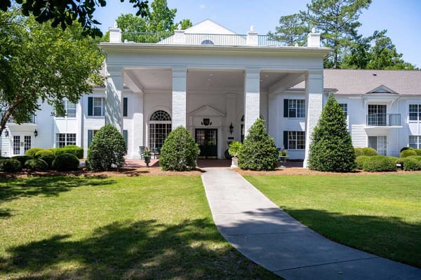 Exterior view of the building entrance at Cumberland Village