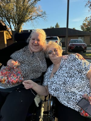 Two residents enjoying outdoor time together