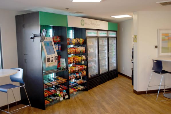 Interior view of a snack area with vending machines