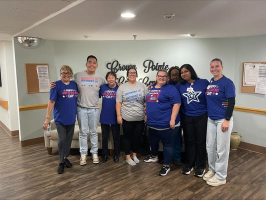 Staff members celebrating an event in the common area