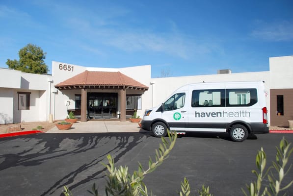 Exterior view of the Haven Health Saguaro Valley facility with shuttle.