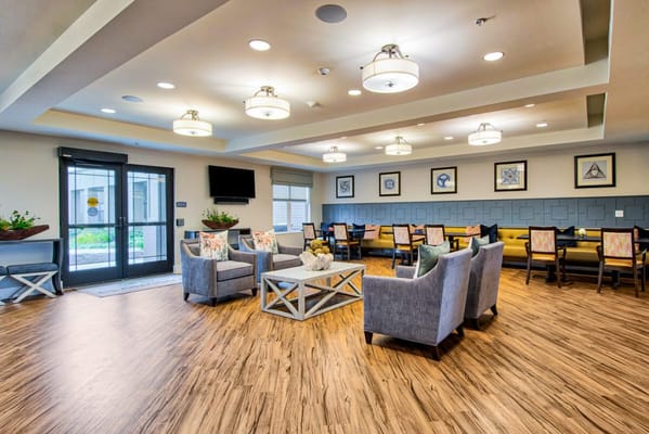 Common area with seating and dining tables