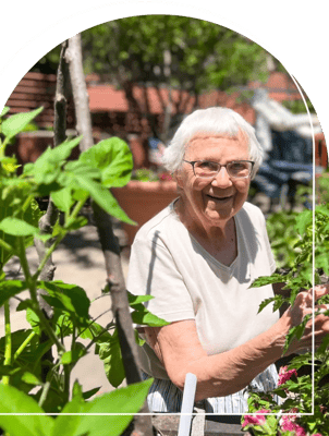 Resident enjoying gardening activities in outdoor space