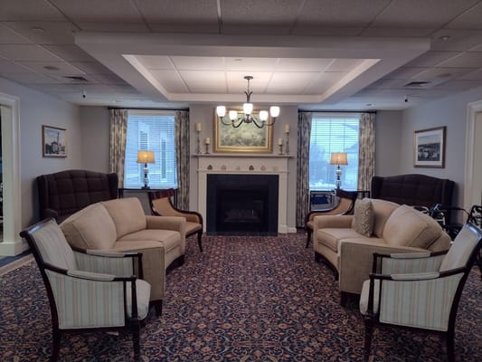 Cozy common area with comfortable seating and fireplace