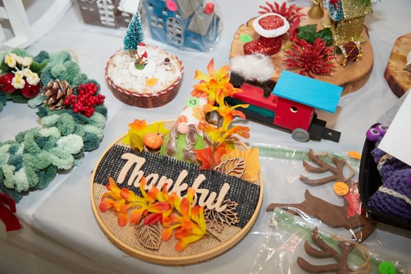 Craft items displayed at a holiday event