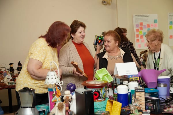 Residents engaging at a craft fair event