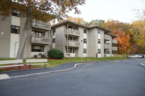 Exterior view of the facility showing buildings and autumn trees