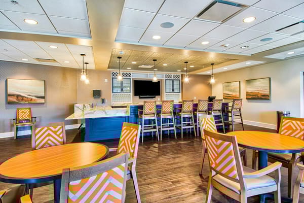 Bright dining area with modern furniture and decor