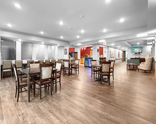 Common area with dining tables and chairs