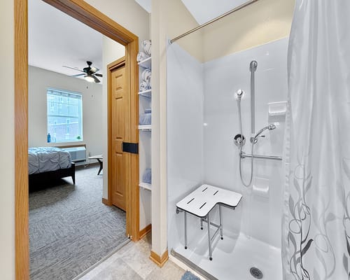 Accessible bathroom with shower and seating