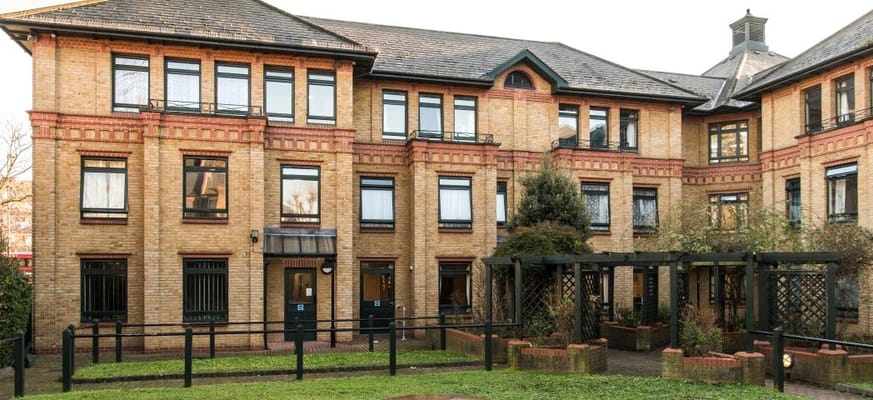 Exterior view of Hillyard House with garden area