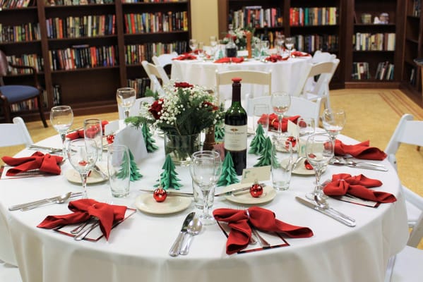Festively decorated dining table set for an event