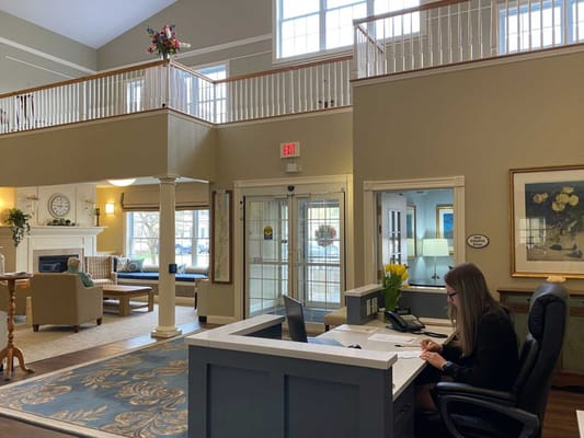 Reception area with staff and seating
