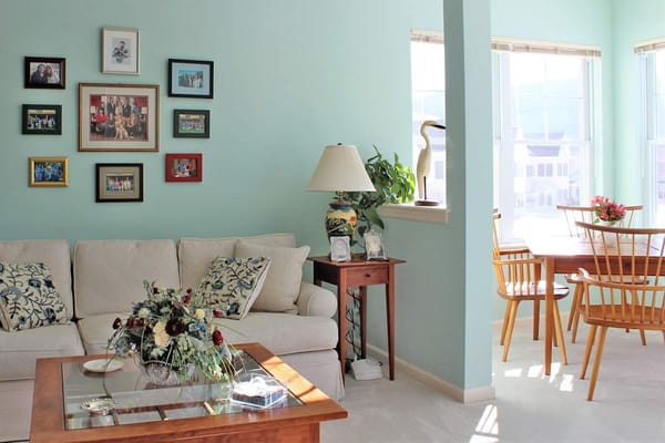 Bright living room with comfortable furniture and personal decor