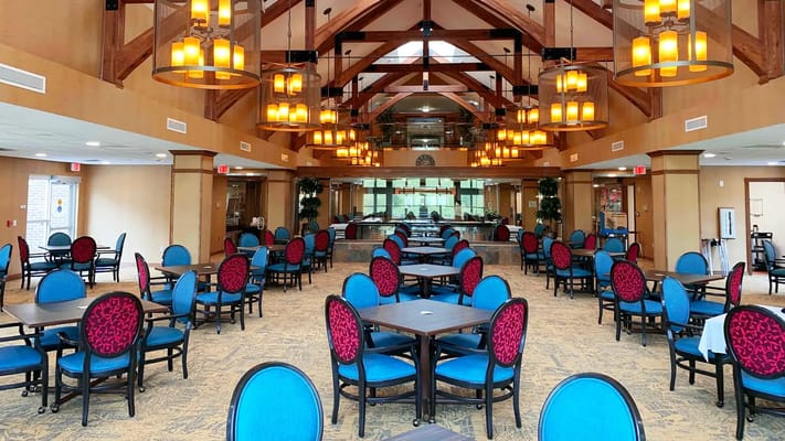 Bright dining room with colorful furniture and decor