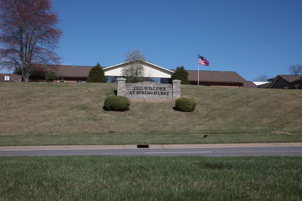 Sign for The Willows at Springhurst facility