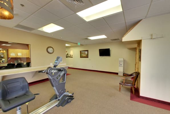 Interior view of a fitness area with exercise equipment